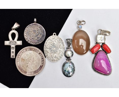 A BAG OF ASSORTED PENDANTS AND A COMMEMORATIVE COIN, to include a large white metal pendant set with a pink banded agate, cor