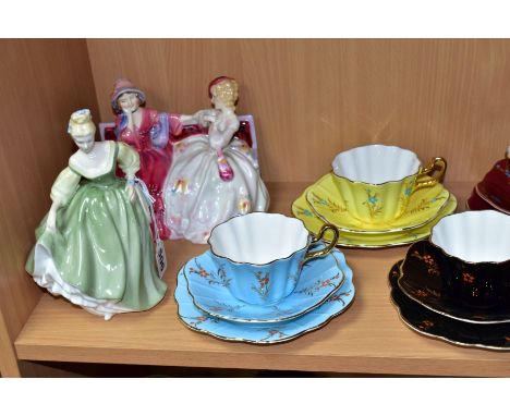 TWO ROYAL DOULTON FIGURES AND TWO TEA SETS, comprising Royal Doulton 'Fair Lady' HN2193 and 'The Gossips' HN2025, a 1950's St