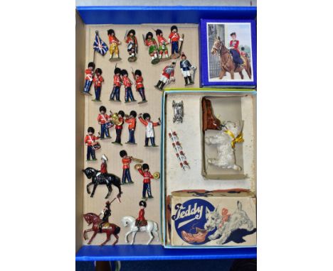 A BOXED TIMPO HOLLOWCAST MOUNTED FIGURE OF THE QUEEN, appears complete and in fairly good condition with only minor paint los