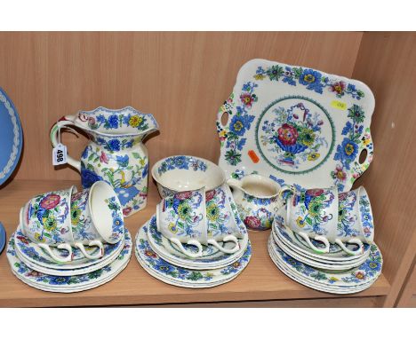 A MASONS IRONSTONE 'STRATHMORE' PATTERN TEASET AND A 'REGENCY' PATTERN JUG, the jug height 15.5cm, the tea set comprises a br