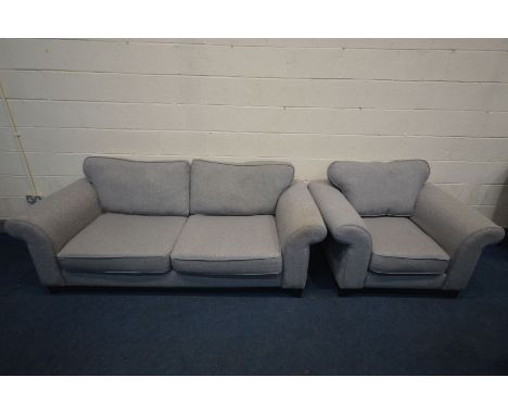 A GREY UPHOLSTERED DFS MODEL 'EDWIN' TWO PIECE LOUNGE SUITE, comprising of a three seater sofa, length 218cm and an arm chair