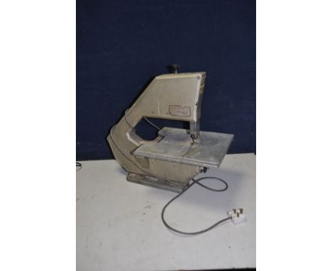 A VINTAGE POWERLINE BBS 20 Mk2 BANDSAW with 57in blade, 12in mouth (PAT fail due to uninsulated plug but working) and a bespo