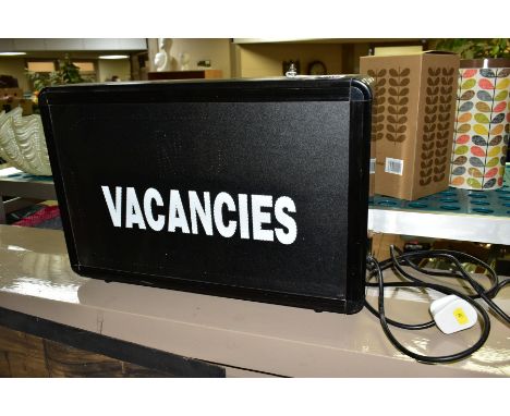 AN ELECTRIC VACANCIES/NO VACANCIES ILLUMINATED SIGN, the fibre optic display has scrolling colours, manufactured by Lighting 