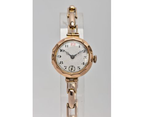 A LADIES 9CT GOLD WRISTWATCH, hand wound movement, round white dial, Arabic numerals, seconds subsidiary dial at the six o'cl