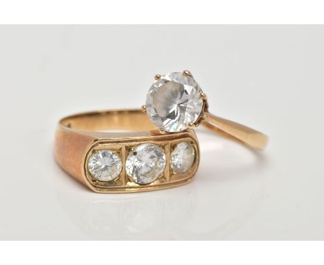 TWO 9CT GOLD CUBIC ZIRCONIA SET RINGS, the first a single stone ring set with a circular cut cubic zirconia, tapered shoulder