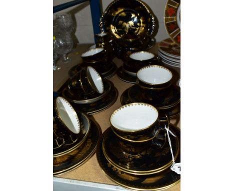 BOOTHS SILICON CHINA TEAWARES, gilt Oriental scene over a black ground, comprising eleven cups and saucers, twelve side plate