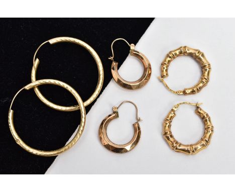 THREE PAIRS OF YELLOW METAL HOOP EARRINGS, the first a pair of bamboo design creole hollow hoops, post clip fittings, stamped