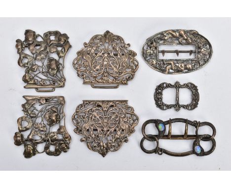 THREE SILVER BUCKLES AND TWO OTHERS, the first of an openwork floral design, hallmarked 'William Comyns &amp; Sons' London 19