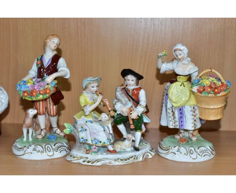 A PAIR OF DRESDEN PORCELAIN FIGURES AND A SITZENFORF FIGURE GROUP, comprising Dresden lady and gentleman flower vendors on sc