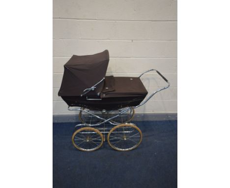 A FOLDING SILVER CROSS PRAM