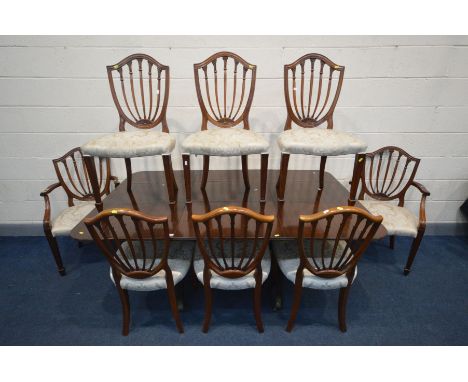 A MAHOGANY TWIN PEDESTAL DINING TABLE, with one additional leaf, extended length 184cm x closed length 123cm x depth 115cm x 