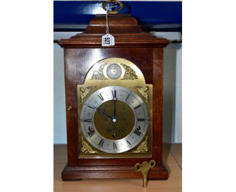 A REPRODUCTION MAHOGANY CASED ELLIOT OF LONDON EIGHT DAY LEVER WESTMINSTER/WHITTINGTON CHIME BRACKET CLOCK, the caddy style t