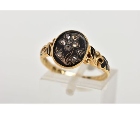 A MID VICTORIAN DIAMOND AND BLACK ENAMEL MEMORIAL RING, the oval ring head with a flower design set with rose cut diamonds on