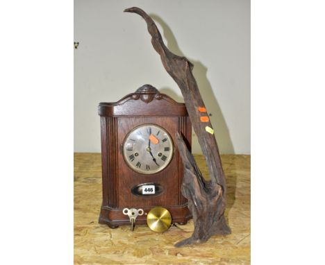 AN EARLY 20TH CENTURY OAK CASED BRACKET CLOCK, swan neck pediment over a circular silvered dial, Roman numerals, eight day mo