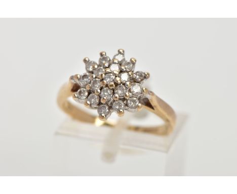 A 9CT GOLD DIAMOND CLUSTER RING, the cluster designed with claw set, round brilliant cut diamonds, stamped diamond weight 0.5