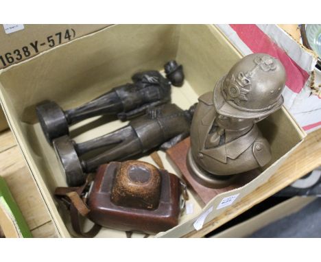 Models of policemen and a camera.