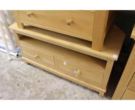 A good modern light oak corner TV stand.