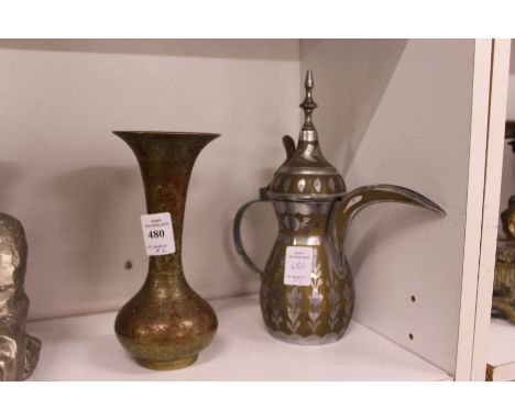 A Persian enamel decorated brass vase and ewer.