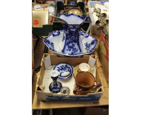 A blue and white jug and basin and other decorative china.