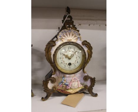 A French porcelain and ormolu mounted mantle clock.