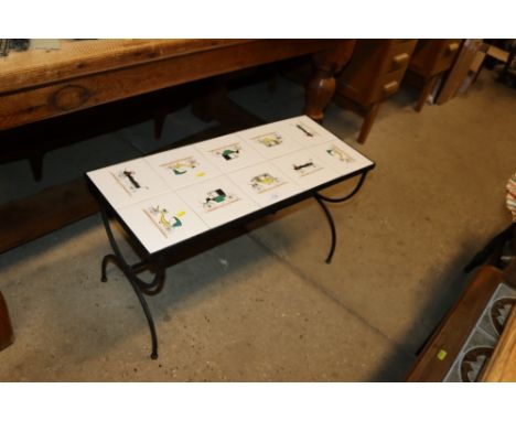 A wrought iron based and tile topped table decorated with horse drawn carriages 