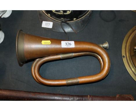 A copper and brass bugle 