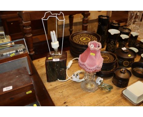 A rustic wooden table lamp and a glass lustre converted table lamp