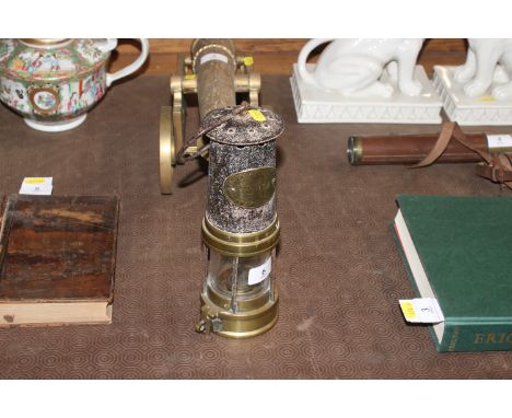 A vintage brass and iron miners lamp by Thomas &amp; Williams, Aberdare