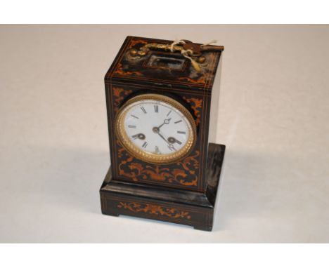 A 19th Century marquetry inlaid mantel clock with key