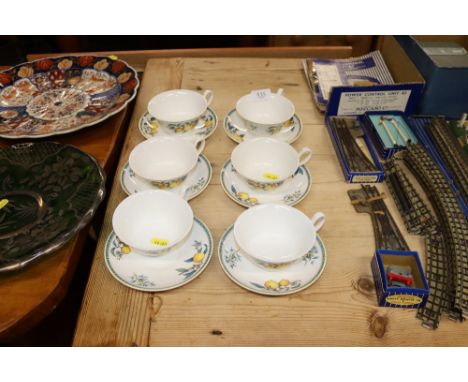 Six Wedgwood "Citrons" pattern cups and saucers 
