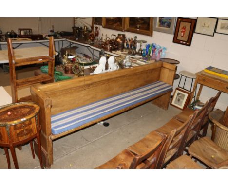 A stripped pine bench
