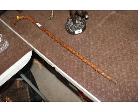 A rustic wooden walking stick with silver collar AF 