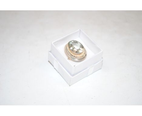 A large Sterling silver and green amethyst dress ring, ring size K/L, 12gms 