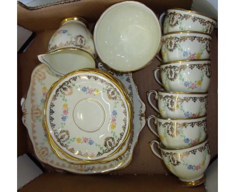 Vintage tea set with floral and gilt pattern