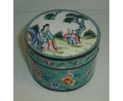 Small Oriental circular enamel pot with floral border and central panel to the lid depicting courting couple