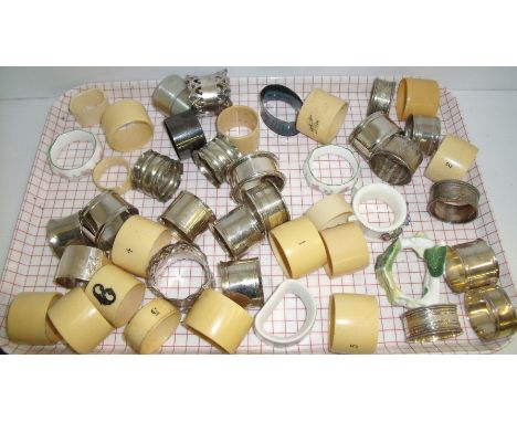 Selection of various napkin rings including bone, silver plate, ceramic etc.