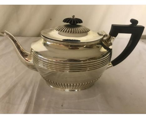 An HM silver teapot