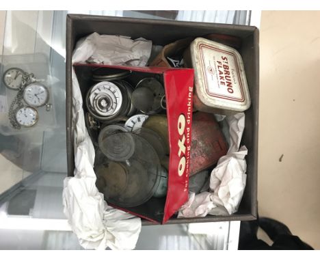Tins of clock spares