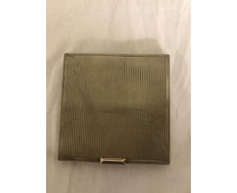 A 14k gold and silver cigarette case
