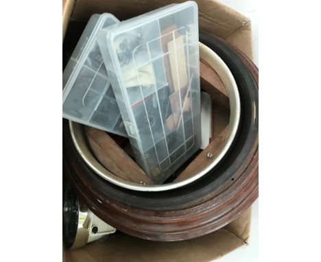 A box of clock spares and alarm clocks