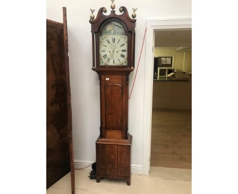 A 19th century oak longcase clock the dial signed Thos Gibson, Berwick on Tweed