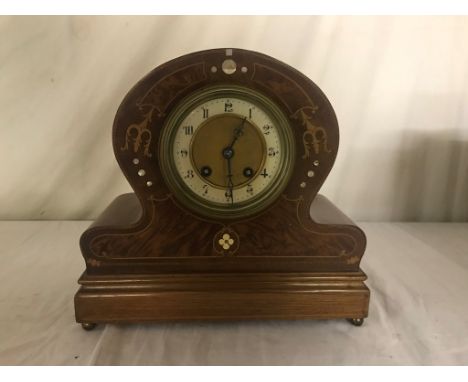 An Art Nouveau-style mantel clock
