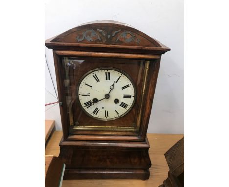 A 19th century arch-cased mantel clock with a Russian eagle to finial