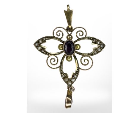 An Edwardian 9ct yellow gold seed pearl and amethyst pendant, length including bale 41 mm.