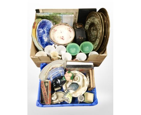 A crate containing embossed brass chargers, ceramics, rolls razor in box, a Kodak brownie box camera, Beswick decanter in the