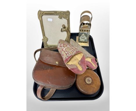 An Art Nouveau-style brass photograph frame, together with a copper oil lamp, a 19th century leather satchel, an antique tape