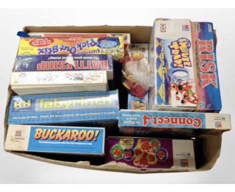 A box of assorted boardgames, a Scalextric racing set, a pinball machine in box.