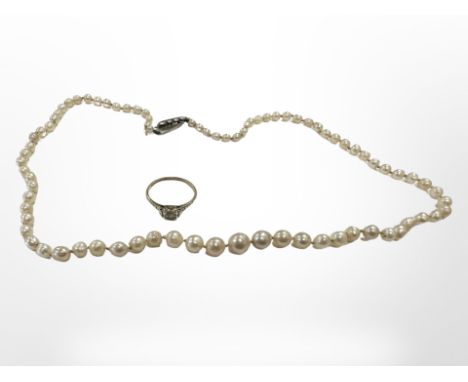 An antique graduated cultured pearl necklace with marcasite clasp, together with a 9ct yellow gold ring. (2) CONDITION REPORT