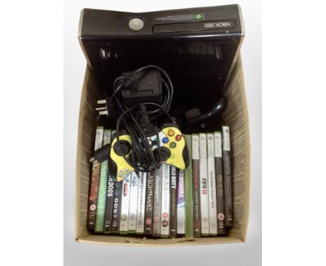 An Xbox 360 console with controllers and assorted games.
