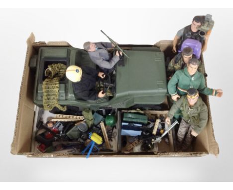 A collection of Action Man toys including army jeep, several figures, equipment including clothing, guns, etc.